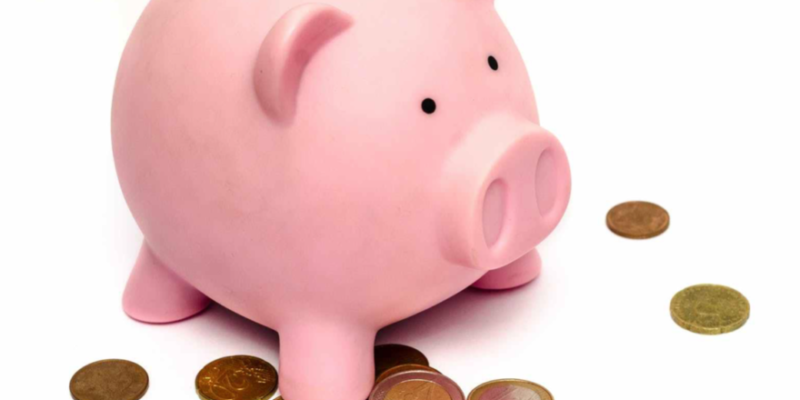Piggy bank and coins