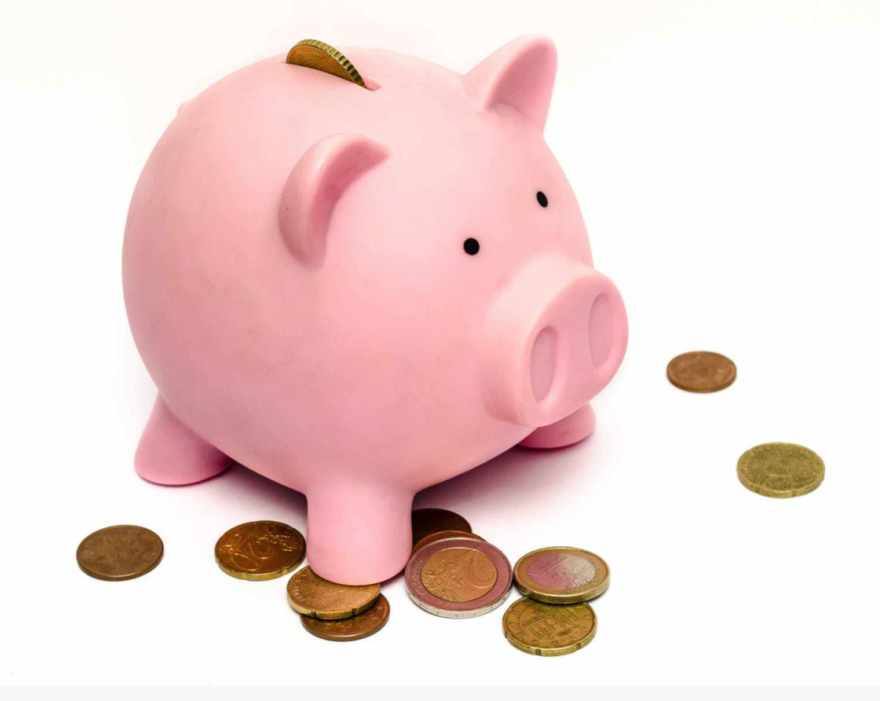 Piggy bank and coins
